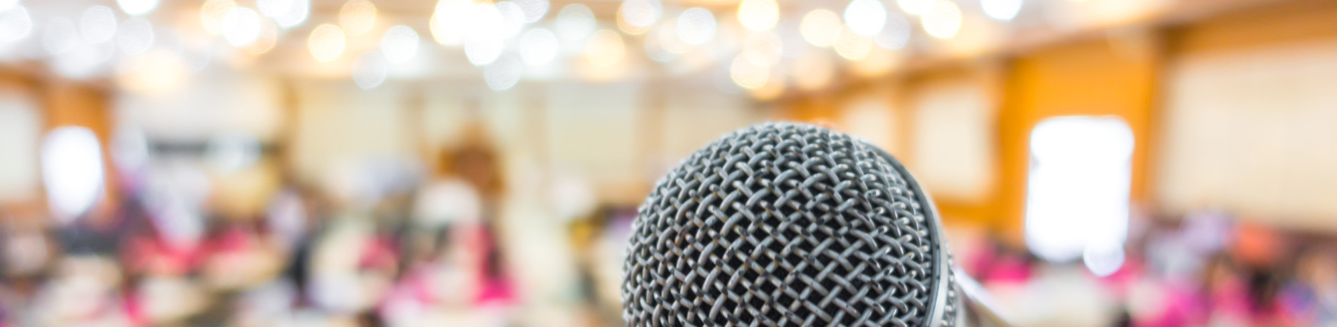 Black microphone in conference room